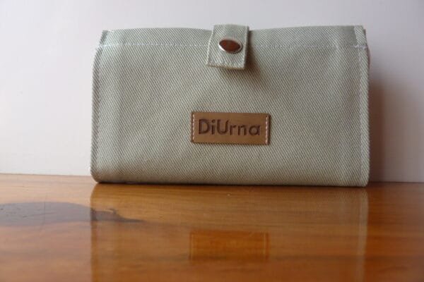 BOLSA MONEDERO PLEGABLE DiUrna verde claro