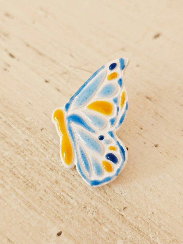 ESCARAPELA MARIPOSA