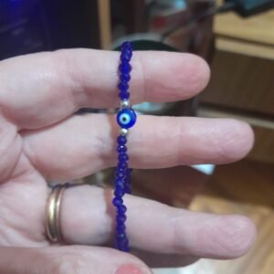 pulsera azulin con cristales facetados azules y ojo protector