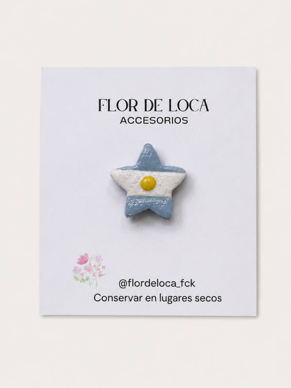 Escarapelita polimérica estrella con sol